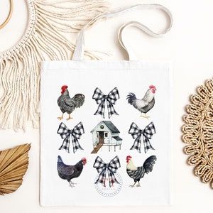 May include: A white tote bag with a black and white checkered bow, a white chicken coop, and black and white roosters and hens. The tote bag has a black and white checkered bow design.