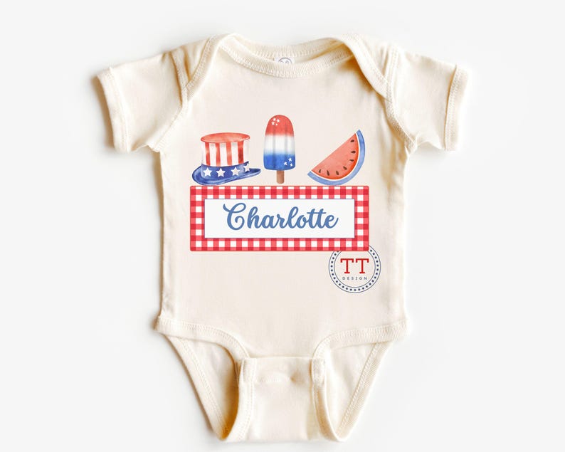 May include: A white baby bodysuit with a red, white, and blue Fourth of July theme. The bodysuit features a watermelon slice, an ice cream pop, and a top hat with stars and stripes. The text "Charlotte" is printed on a red and white checkered background.