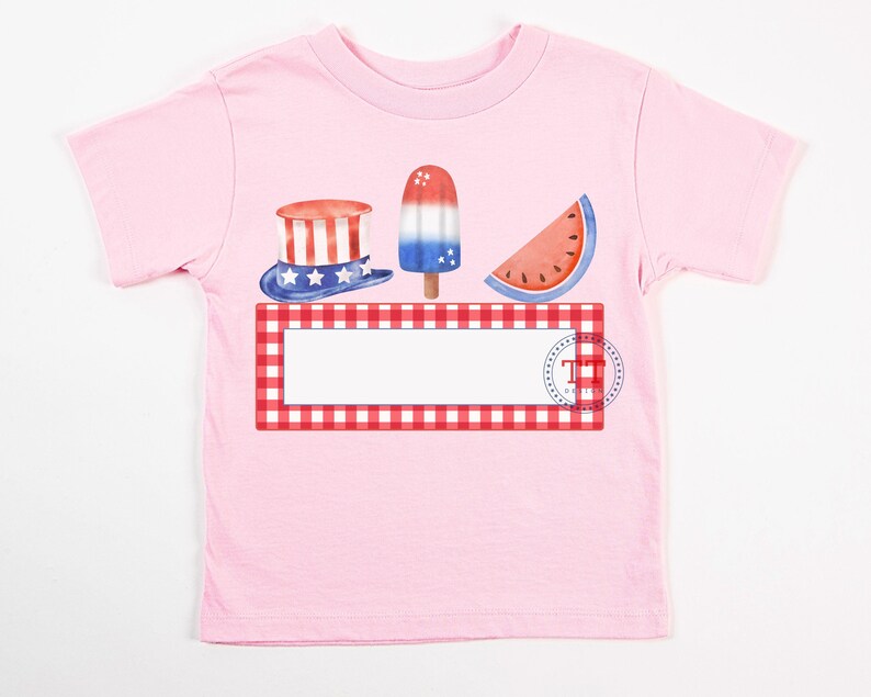 May include: Pink t-shirt with a red, white, and blue watermelon, ice cream, and top hat graphic. The graphic is on a red and white checkered background. The text "The" is printed on the graphic.