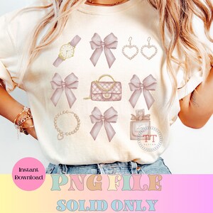 May include: A digital download of a set of 8 pink and gold watercolor illustrations. The illustrations include a watch, a purse, a pair of earrings, a necklace, and four bows. The text "PNG FILE SOLID ONLY" is at the bottom of the image.