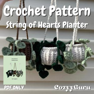 May include: Crochet pattern for a String of Hearts hanging planter. The pattern is available as a PDF download. The image shows three crocheted planters with green leaves.