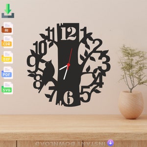 May include: Black clock with a tree design and a bird perched on a branch. The clock face has Roman numerals and a red hour hand and white minute hand.