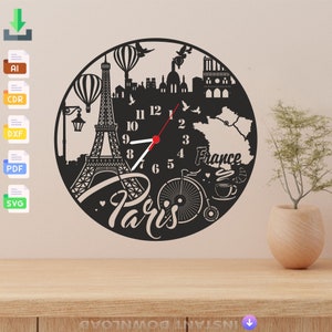 May include: Black and white clock design featuring the Eiffel Tower, hot air balloons, a bicycle, and the words "Paris" and "France".