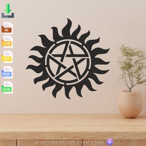 May include: Black and white graphic of a pentagram inside a circle with sun rays around it. The symbol is often associated with the TV show Supernatural.