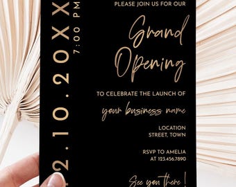 May include: Black and gold grand opening invitation with the date 2.10.20XX, time 7:00 PM, and the text "Please join us for our Grand Opening" to celebrate the launch of your business name. The invitation also includes the location, RSVP information, and the text "See you there!"