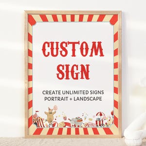 May include: A red and white striped sign with the text "CUSTOM SIGN" in red letters. Below the text is the phrase "CREATE UNLIMITED SIGNS PORTRAIT + LANDSCAPE". The sign is surrounded by a wooden frame.