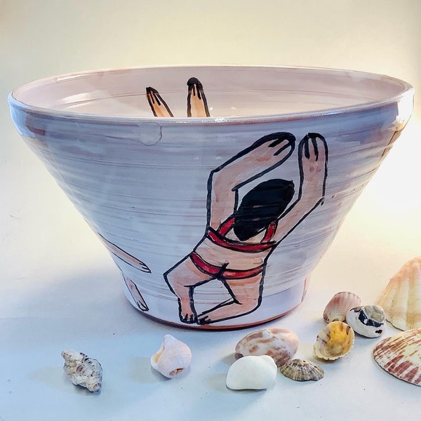 ceramic bowl , the swimmers