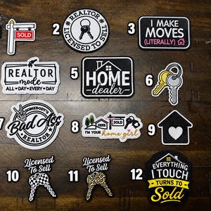 May include: A collection of twelve embroidered patches featuring real estate themes. Designs include a sold sign, keys, and text such as I Make Moves, Realtor Mode, Home Dealer, Bad Ass Realtor, I'm Your Home Girl, Licensed To Sell, and Sold.
