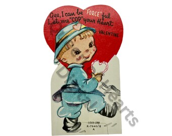 May include: A vintage Valentine's Day card featuring a cartoon boy dressed as a police officer. The boy is holding a heart-shaped card and walking towards the viewer. The card has a red heart shape with the text "Gee, I can be FORCE"ful Let me "COP" your Heart VALENTINE".