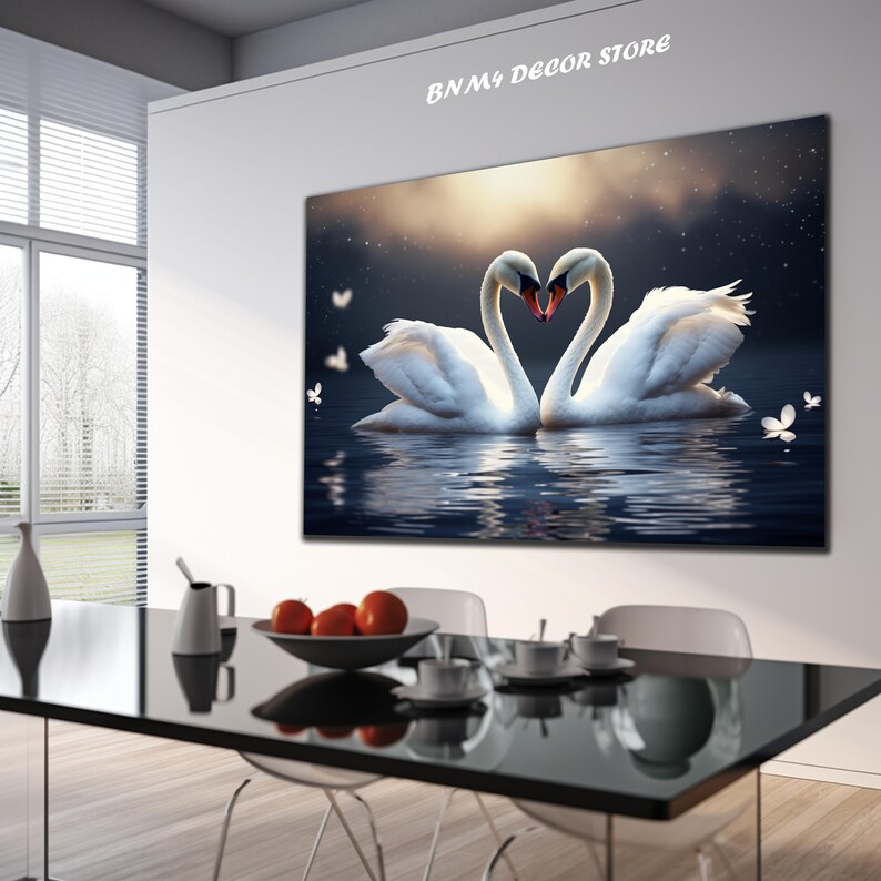 May include: Two white swans with their necks intertwined in the shape of a heart, floating on a dark blue lake with a starry sky and a golden sunset in the background.  The swans are reflected in the water.