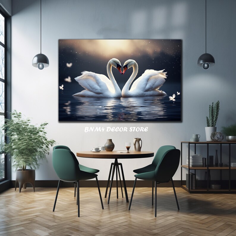 May include: Two white swans with their necks intertwined in the shape of a heart, floating on a dark blue lake with a starry sky and white butterflies in the background. The swans are facing each other and their beaks are touching. The image is titled "BNMY DECOR STORE".