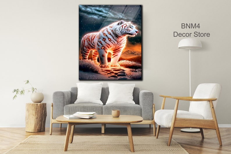May include: A white tiger with orange stripes stands on a snowy landscape with a starry night sky in the background. The tiger is glowing with a warm orange light.