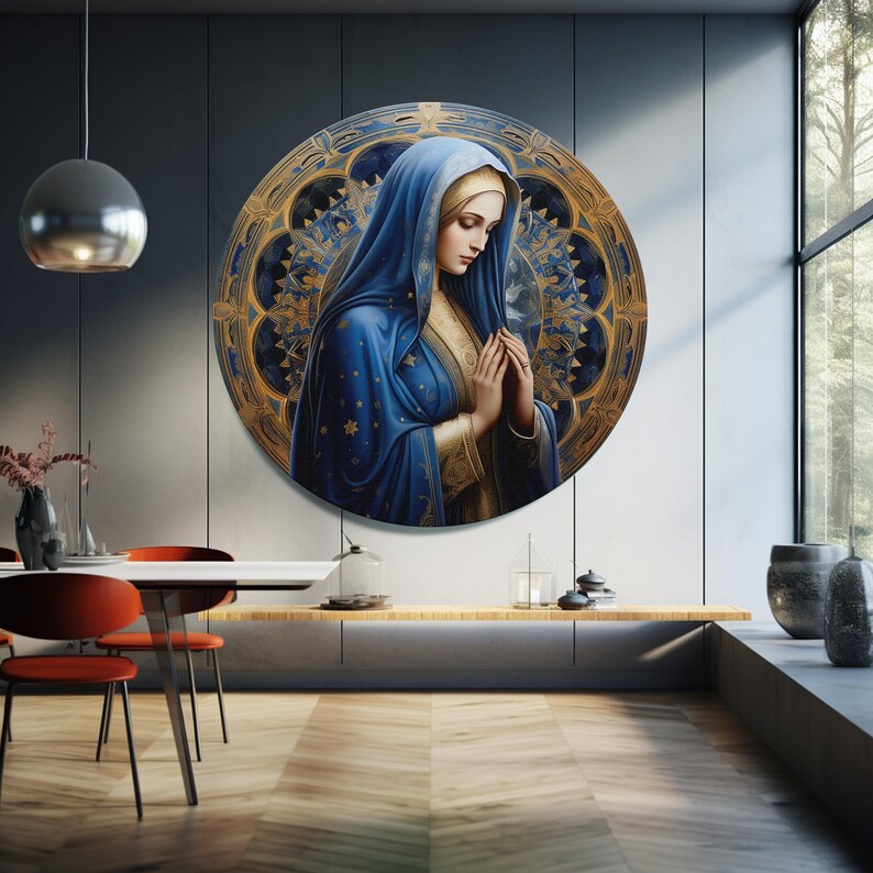 May include: A round painting of a woman in a blue robe with a gold background. The woman is praying with her hands clasped together. The painting is surrounded by a gold frame with a decorative design.