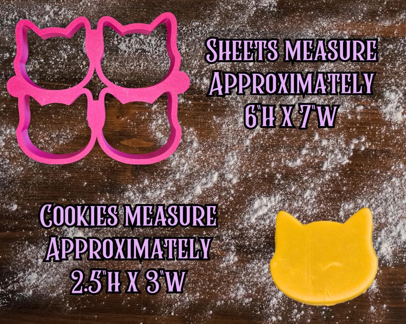 May include: A pink cat-shaped cookie cutter set and a single yellow cookie on a wooden surface dusted with flour. The text indicates the sheet measures approximately 6"H x 7"W, and the cookies measure approximately 2.5"H x 3"W.