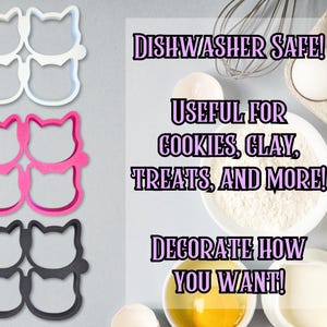 May include: A set of cat-shaped cookie cutters in white, pink, and black. The image includes text that reads "Dishwasher Safe! Useful for Cookies, Clay, Treats, and More! Decorate How You Want!"