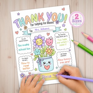May include: A printable "Thank You" card with a floral design and the text "Thank You!" in pastel colors. The card includes fill-in-the-blank sections and the name "Olivia" is being written on the card with a purple pencil. The card is available in two sizes.