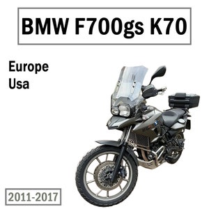 May include: A gray BMW F700gs K70 motorcycle with a windshield and luggage. The motorcycle is from 2011-2017 and is available in Europe and the USA.
