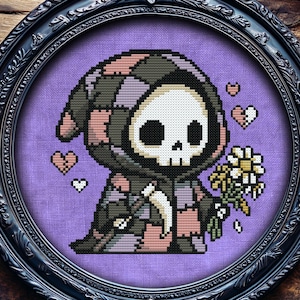May include: Cross-stitch art of a cartoon Grim Reaper holding flowers and hearts, framed in a black ornate oval frame. The Reaper is in a patchwork robe with a skull face. The background is a light purple fabric.