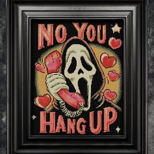May include: Framed artwork featuring a pixelated image of the Ghostface mask holding a red telephone. The text "NO YOU HANG UP" is displayed in a retro font, with red hearts and a star accenting the design. The frame is black.