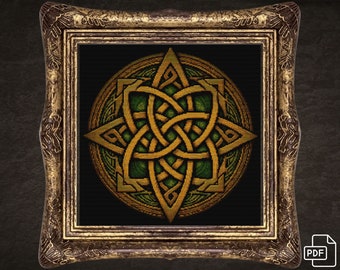 Puede incluir: Un diseño de nudo celta dorado y verde en un marco circular. El nudo es intrincado y detallado, con un fondo oscuro.