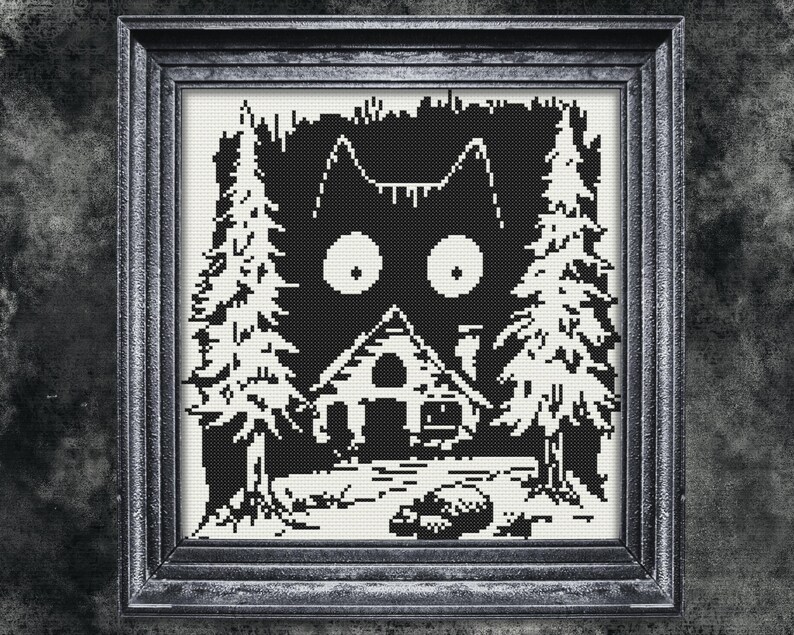 May include: Black and white cross-stitch pattern of a cat with large eyes peering out from behind a small house in a forest setting.