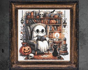 May include: A framed print depicts a ghost wearing glasses, reading in a cozy armchair. A black cat sits nearby. The scene includes a bookshelf, pumpkins, a skull, and a lit candle, creating a Halloween theme.