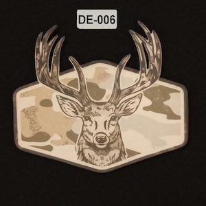 May include: A deer head graphic with large antlers is centered on a beige and camouflage-patterned background. The graphic is set within a hexagonal frame. The text "DE-006" is in the upper left corner. The image is on a black background.