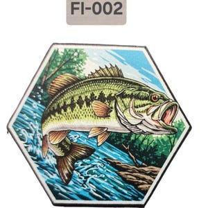 May include: A hexagonal shaped patch with a green and brown bass fish jumping out of the water. The fish is in a blue stream with green trees in the background. The patch has the text "FI-002" on it.