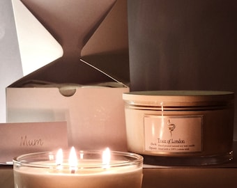 Luxury hand poured 3 wick natural soy wax scented candle. Comes with lid, gift box & option of a personalised card.