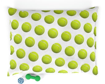 Cama para mascotas con forma de pelota de tenis