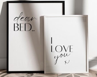 May include: Two black framed prints with white backgrounds. The larger print says "dear BED..." and the smaller print says "I LOVE you x".