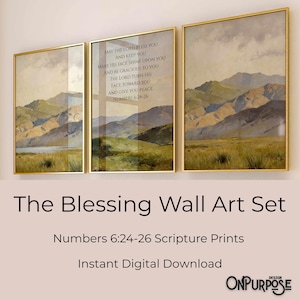 May include: A triptych of framed wall art with gold frames. The artwork depicts a landscape with mountains and fields. The center panel features text from Numbers 6:24-26. The set is titled "The Blessing Wall Art Set."