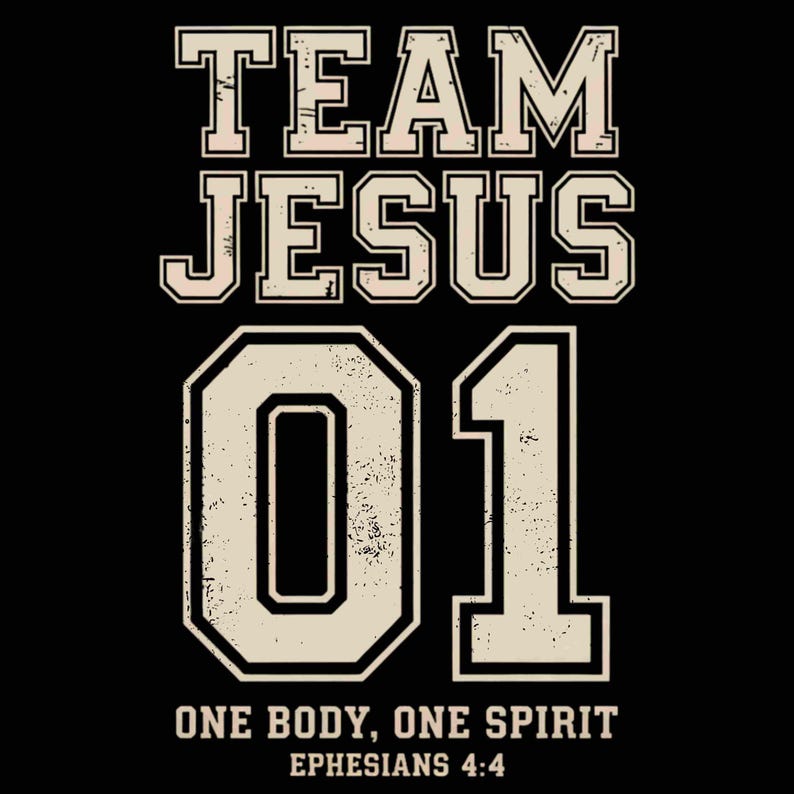 "Team Jesus 01" graphic design featuring bold varsity-style lettering in beige on a black background, with the Bible verse "One Body, One Spirit – Ephesians 4:4" displayed beneath. The design combines a sporty aesthetic with Christian faith messaging.