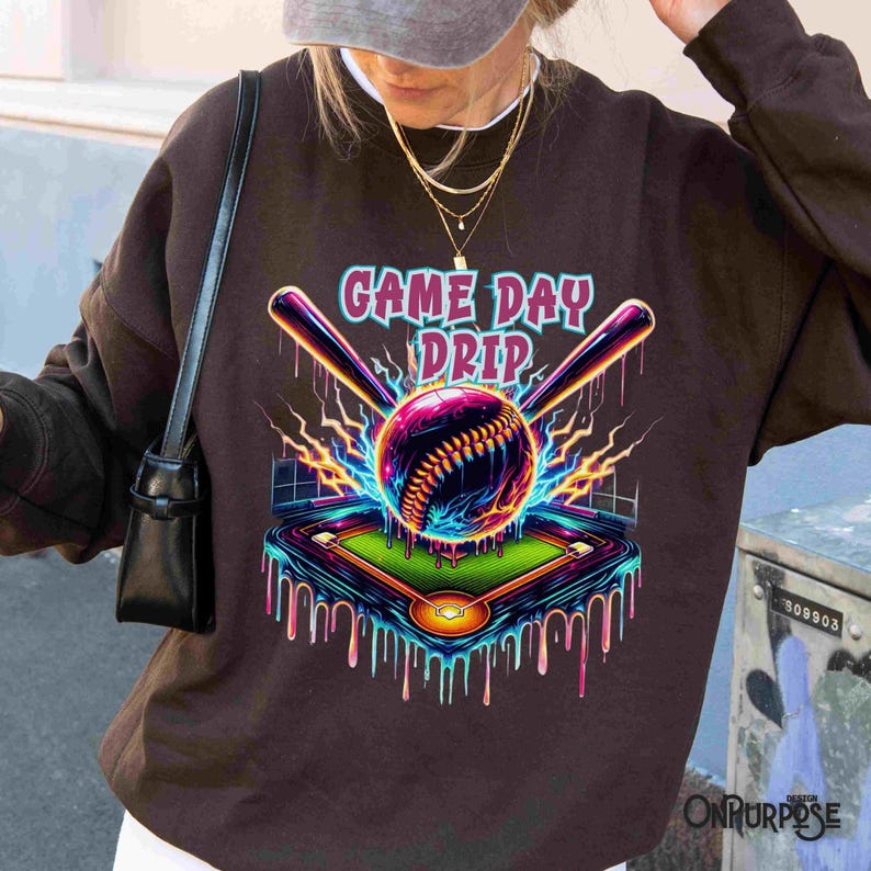 "Vibrant baseball with neon drip effects, surrounded by lightning bolts and crossed bats, with a glowing baseball field below. The words 'Game Day Drip' in bold, colorful font. Perfect for baseball fans and players."