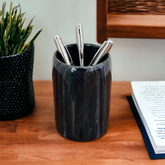 Solid natural black marble pen holder with genuine white veining — heavier and more luxurious in person than any plastic or resin imitation.