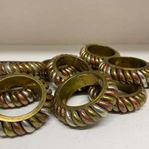 Set of 11 Brass and Copper Hand Crafted Napkin Rings