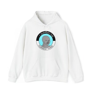 May include: White hooded sweatshirt with a black and white circle graphic featuring a gray face and the text "I support the current thing".