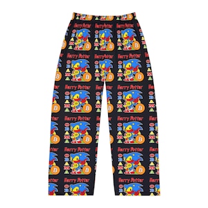 May include: Black pajama pants with a repeating pattern of a blue cartoon character holding a Bitcoin, with the text "Harry Potter" in red. The design includes the letters "B", "A", and "M".