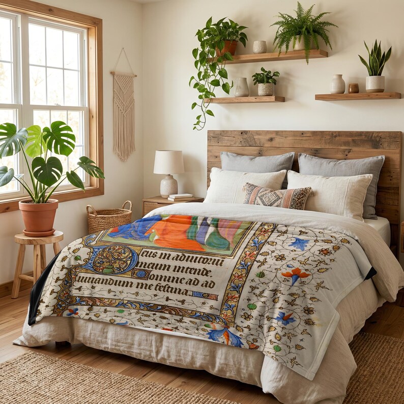 Nativity plush blanket spread over a bed beneath shelves of houseplants