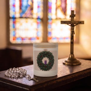 Styled photograph of First Sunday of Advent frosted glass candle