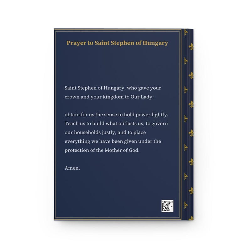 Photograph of St. Stephen of Hungary lined journal, with the prayer typeset on the back cover, navy and gold fleur-de-lis spine, back cover
