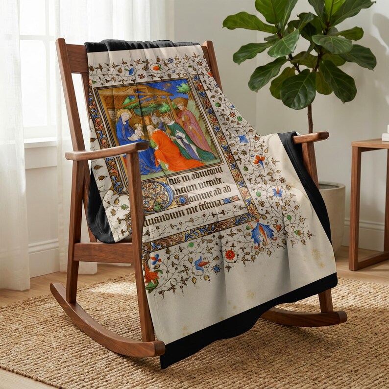 Nativity plush blanket draped over a wooden rocking chair