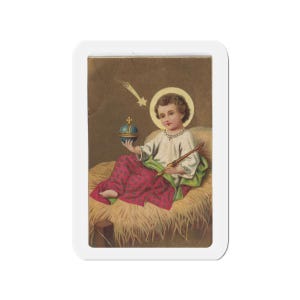 Styled photograph of Christmas Catholic gift, front view
