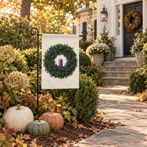 Advent garden flag on a garden stand among autumn hydrangeas and pumpkins by a front walk