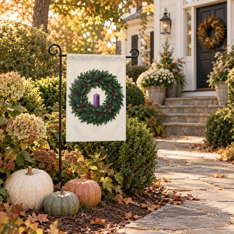 Advent garden flag on a garden stand among autumn hydrangeas and pumpkins by a front walk