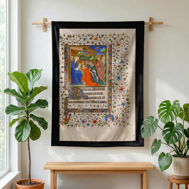 Nativity plush blanket hung on a wall from a wooden rod above a bench, between potted plants