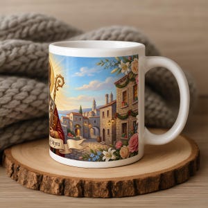 White ceramic mug featuring an illustrated Mediterranean village scene with stone buildings, a golden sun, flowering vines, and a scroll labeled St. Myra, displayed on a wooden round coaster with rope in the background