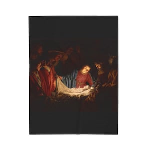 May include: A rectangular wall art print featuring a dark, dramatic oil painting of a nativity scene. A central infant glows with light, surrounded by figures in red, blue, and brown robes. The composition uses high contrast and deep shadows.