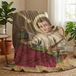 Christmas plush blanket draped over a chair beside a window