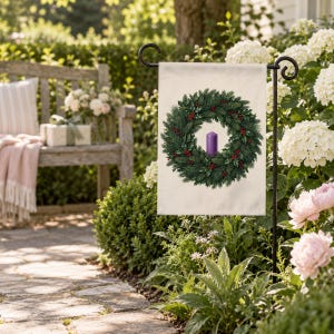 Advent garden flag on a garden stand among white hydrangeas and peonies beside a garden bench